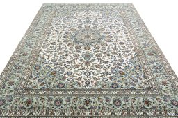 Surface texture of 2000s Kashan rug with natural Wool and intricate pattern
