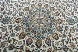 Central medallion detail of 2000s Kashan rug from Iran / Persia