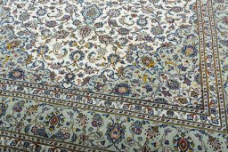 Close-up detail of 2000s Kashan rug from Iran / Persia showing Wool weave