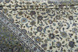 Close-up detail of 2000s Kashan rug from Iran / Persia showing Wool weave