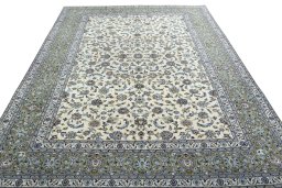 Surface texture of 2000s Kashan rug with natural Wool and intricate pattern