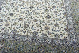 Close-up detail of 2000s Kashan rug from Iran / Persia showing Wool weave
