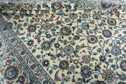 Close-up detail of 2000s Kashan rug from Iran / Persia showing Wool weave