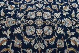 Central medallion detail of 2000s Kashan rug from Iran / Persia