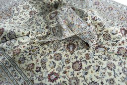 Surface texture of 2000s Kashan rug with natural Wool and intricate pattern