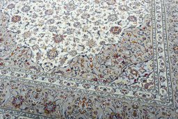 Close-up detail of 2000s Kashan rug from Iran / Persia showing Wool weave