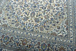 Close-up detail of 2000s Kashan rug from Iran / Persia showing Wool weave