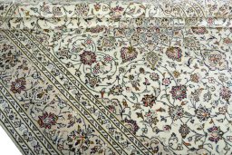 Close-up detail of 2000s Kashan rug from Iran / Persia showing Wool weave