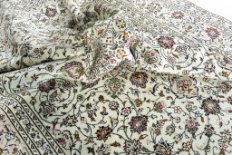 Surface texture of 2000s Kashan rug with natural Wool and intricate pattern