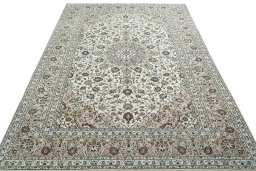 Surface texture of 2000s Kashan rug with natural Wool and intricate pattern