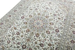 Backside of handmade 2000s Kashan rug showing knot structure and weave density