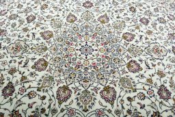 Central medallion detail of 2000s Kashan rug from Iran / Persia