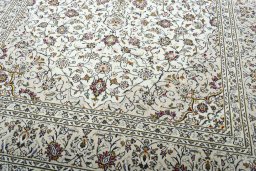 Close-up detail of 2000s Kashan rug from Iran / Persia showing Wool weave
