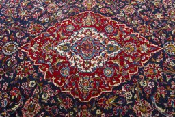 Central medallion detail of 2000s Kashan rug from Iran / Persia