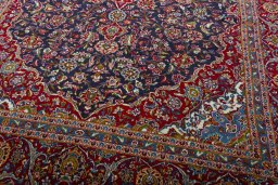 Close-up detail of 2000s Kashan rug from Iran / Persia showing Wool weave