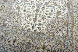 Close-up detail of 2000s Kashan rug from Iran / Persia showing Wool weave