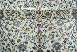 Close-up detail of 2000s Kashan rug from Iran / Persia showing Wool weave