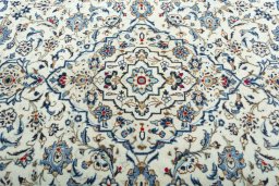 Central medallion detail of 2000s Kashan rug from Iran / Persia