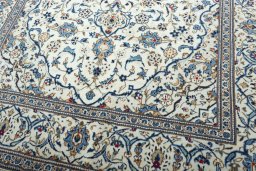 Close-up detail of 2000s Kashan rug from Iran / Persia showing Wool weave