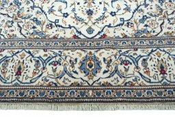 Full view of 2000s Kashan rug from Iran / Persia, 297 × 195 cm in Beige tones