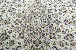 Central medallion detail of 2000s Kashan rug from Iran / Persia