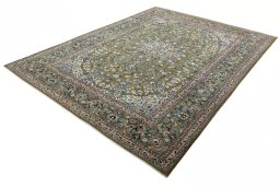 Corner detail of 2000s Kashan rug showing border pattern and Wool pile