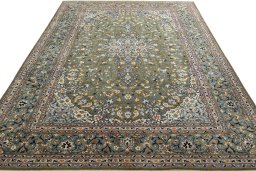 Surface texture of 2000s Kashan rug with natural Wool and intricate pattern