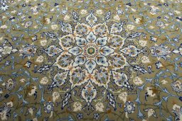 Central medallion detail of 2000s Kashan rug from Iran / Persia