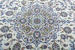 Central medallion detail of 2000s Kashan rug from Iran / Persia