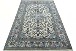 Surface texture of 2000s Kashan rug with natural Wool and intricate pattern