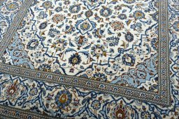 Close-up detail of 2000s Kashan rug from Iran / Persia showing Wool weave