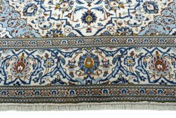 Full view of 2000s Kashan rug from Iran / Persia, 305 × 200 cm in Beige tones