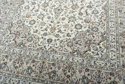 Close-up detail of 2000s Kashan rug from Iran / Persia showing Wool weave