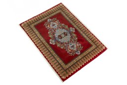 Corner detail of New Kashan rug showing border pattern and Cork pile