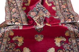 Surface texture of 1930s Kashan rug with natural Cork and intricate pattern