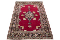 Surface texture of 1930s Kashan rug with natural Cork and intricate pattern