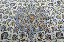 Central medallion detail of 2000s Kashan rug from Iran / Persia