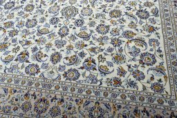 Close-up detail of 2000s Kashan rug from Iran / Persia showing Wool weave