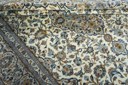 Close-up detail of 2000s Kashan rug from Iran / Persia showing Wool weave