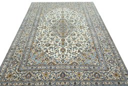 Surface texture of 2000s Kashan rug with natural Wool and intricate pattern