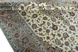 Close-up detail of 2000s Kashan rug from Iran / Persia showing Wool weave