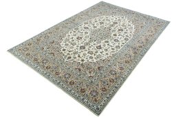 Corner detail of 2000s Kashan rug showing border pattern and Wool pile