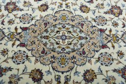 Central medallion detail of 2000s Kashan rug from Iran / Persia