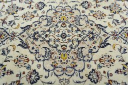 Central medallion detail of 2000s Kashan rug from Iran / Persia