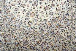Close-up detail of 2000s Kashan rug from Iran / Persia showing Wool weave