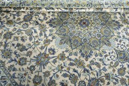 Close-up detail of 2000s Kashan rug from Iran / Persia showing Cork weave