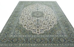 Surface texture of 2000s Kashan rug with natural Cork and intricate pattern