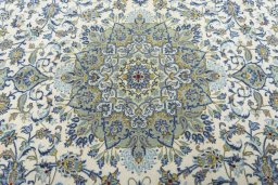 Central medallion detail of 2000s Kashan rug from Iran / Persia