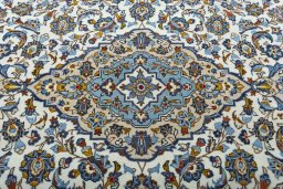 Central medallion detail of 2000s Kashan rug from Iran / Persia