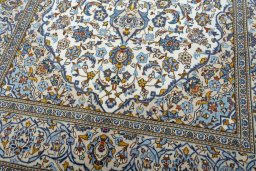 Close-up detail of 2000s Kashan rug from Iran / Persia showing Wool weave